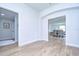 Hallway with archway leading to dining area and light flooring at 20131 Nob Oak Ave, Tampa, FL 33647
