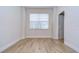 Simple bedroom with light walls and wood flooring at 20131 Nob Oak Ave, Tampa, FL 33647