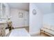 Bright entryway with bench, console table, and fluffy rug at 20131 Nob Oak Ave, Tampa, FL 33647
