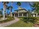 Community clubhouse with palm trees and walkway at 20131 Nob Oak Ave, Tampa, FL 33647