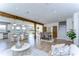 Open floor plan showcasing living, dining, and kitchen areas with hardwood floors at 20131 Nob Oak Ave, Tampa, FL 33647