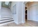 Elegant staircase with wood and white risers, leading to upper level at 20131 Nob Oak Ave, Tampa, FL 33647