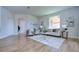 Spacious living room with light beige sofa and large windows at 20131 Nob Oak Ave, Tampa, FL 33647