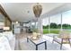 Living room showcasing an open floor plan and access to backyard at 20131 Nob Oak Ave, Tampa, FL 33647