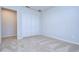 Bright bedroom with double door closet and carpet at 20131 Nob Oak Ave, Tampa, FL 33647