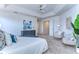 Bright main bedroom with sitting area and access to bathroom at 20131 Nob Oak Ave, Tampa, FL 33647