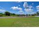 Community lake view with lush green grass at 20131 Nob Oak Ave, Tampa, FL 33647