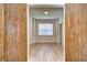 Bright office with wood accent wall and wood flooring at 20131 Nob Oak Ave, Tampa, FL 33647