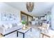 Open concept living room with view into kitchen and dining area at 20131 Nob Oak Ave, Tampa, FL 33647