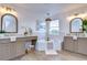 Double vanity bathroom with soaking tub and walk in shower at 20131 Nob Oak Ave, Tampa, FL 33647