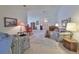 Spacious living room with tiled floors and ample natural light at 812 Mccallister Ave, Sun City Center, FL 33573