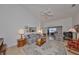 Spacious living room with tile floors and ample natural light at 812 Mccallister Ave, Sun City Center, FL 33573