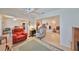 Living room with comfortable seating and access to other rooms at 812 Mccallister Ave, Sun City Center, FL 33573