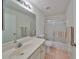Neat bathroom with tub, shower, and single vanity at 812 Mccallister Ave, Sun City Center, FL 33573