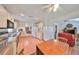 Kitchen with view into the living room and breakfast nook at 812 Mccallister Ave, Sun City Center, FL 33573