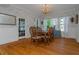 Elegant dining room featuring hardwood floors, a chandelier, and built-in cabinetry at 5297 Huntington Ne St, St Petersburg, FL 33703