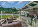 Relaxing patio area with comfortable seating and umbrella at 5297 Huntington Ne St, St Petersburg, FL 33703