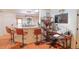 Bright kitchen features a breakfast bar with seating, and is open to other living spaces at 4504 Horseshoe Pick Ln, Valrico, FL 33594