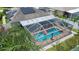 Aerial view showcases the home's private pool and fenced backyard at 4504 Horseshoe Pick Ln, Valrico, FL 33594