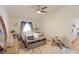 Bright bedroom with a comfortable bed and large mirror at 4504 Horseshoe Pick Ln, Valrico, FL 33594