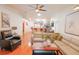 Spacious living area with hardwood floors, neutral walls and ample natural light at 4504 Horseshoe Pick Ln, Valrico, FL 33594