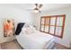 Bright bedroom with large closet and plantation shutters at 4504 Horseshoe Pick Ln, Valrico, FL 33594
