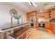 Eat-in kitchen with stainless steel appliances and wood cabinets at 4504 Horseshoe Pick Ln, Valrico, FL 33594