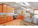 Spacious kitchen with granite counters and an island at 4504 Horseshoe Pick Ln, Valrico, FL 33594
