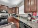 Corner kitchen with ample storage and stainless steel appliances at 17206 White Mangrove Dr, Wimauma, FL 33598