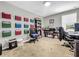 Home office with a desk, chair, and ample storage at 17206 White Mangrove Dr, Wimauma, FL 33598