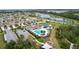 Community features pool, tennis courts, and playground at 17206 White Mangrove Dr, Wimauma, FL 33598