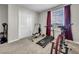 Well-lit bedroom with a double bed, nightstands, and a dresser at 17206 White Mangrove Dr, Wimauma, FL 33598