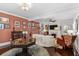 Elegant living room with hardwood floors, decorative accents, and a cozy seating area at 2010 W Dekle Ave, Tampa, FL 33606