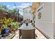 Outdoor dining area with a patio and lush plants at 2010 W Dekle Ave, Tampa, FL 33606