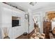 Built-in media center with ample storage and hardwood floors at 2010 W Dekle Ave, Tampa, FL 33606