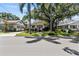 Home exterior showcasing a classic bungalow style with a welcoming front porch at 2010 W Dekle Ave, Tampa, FL 33606