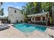 Relaxing pool area with outdoor bar and seating at 2010 W Dekle Ave, Tampa, FL 33606