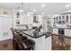 Spacious kitchen with white cabinets, stainless steel appliances, and granite countertops at 2010 W Dekle Ave, Tampa, FL 33606