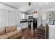 Charming kitchen with white cabinets and black appliances at 2010 W Dekle Ave, Tampa, FL 33606