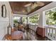 Spacious front porch with seating area and views of the street at 2010 W Dekle Ave, Tampa, FL 33606