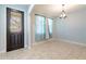Bright dining area with tile floors and light blue walls at 7110 N Taliaferro Ave, Tampa, FL 33604