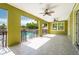 Covered patio overlooking the pool at 7110 N Taliaferro Ave, Tampa, FL 33604