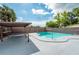 Relaxing pool area with a pergola and plenty of space for lounging at 7110 N Taliaferro Ave, Tampa, FL 33604