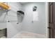 Laundry room with shelving and tile flooring at 7110 N Taliaferro Ave, Tampa, FL 33604