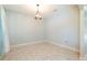 Bright dining area with tile floors and light blue walls at 7110 N Taliaferro Ave, Tampa, FL 33604