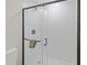 Clean and modern walk-in shower with white subway tile at 5369 Tuscawilla Dr, Weeki Wachee, FL 34607
