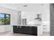 Modern kitchen with large island and stainless steel appliances at 5341 Lake Pearl Ct, Tampa, FL 33625