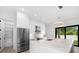 Modern kitchen with stainless steel appliances and pantry at 5341 Lake Pearl Ct, Tampa, FL 33625