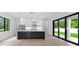 Modern kitchen with large island and stainless steel appliances at 5341 Lake Pearl Ct, Tampa, FL 33625