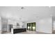 Modern kitchen with large island and stainless steel appliances at 5341 Lake Pearl Ct, Tampa, FL 33625